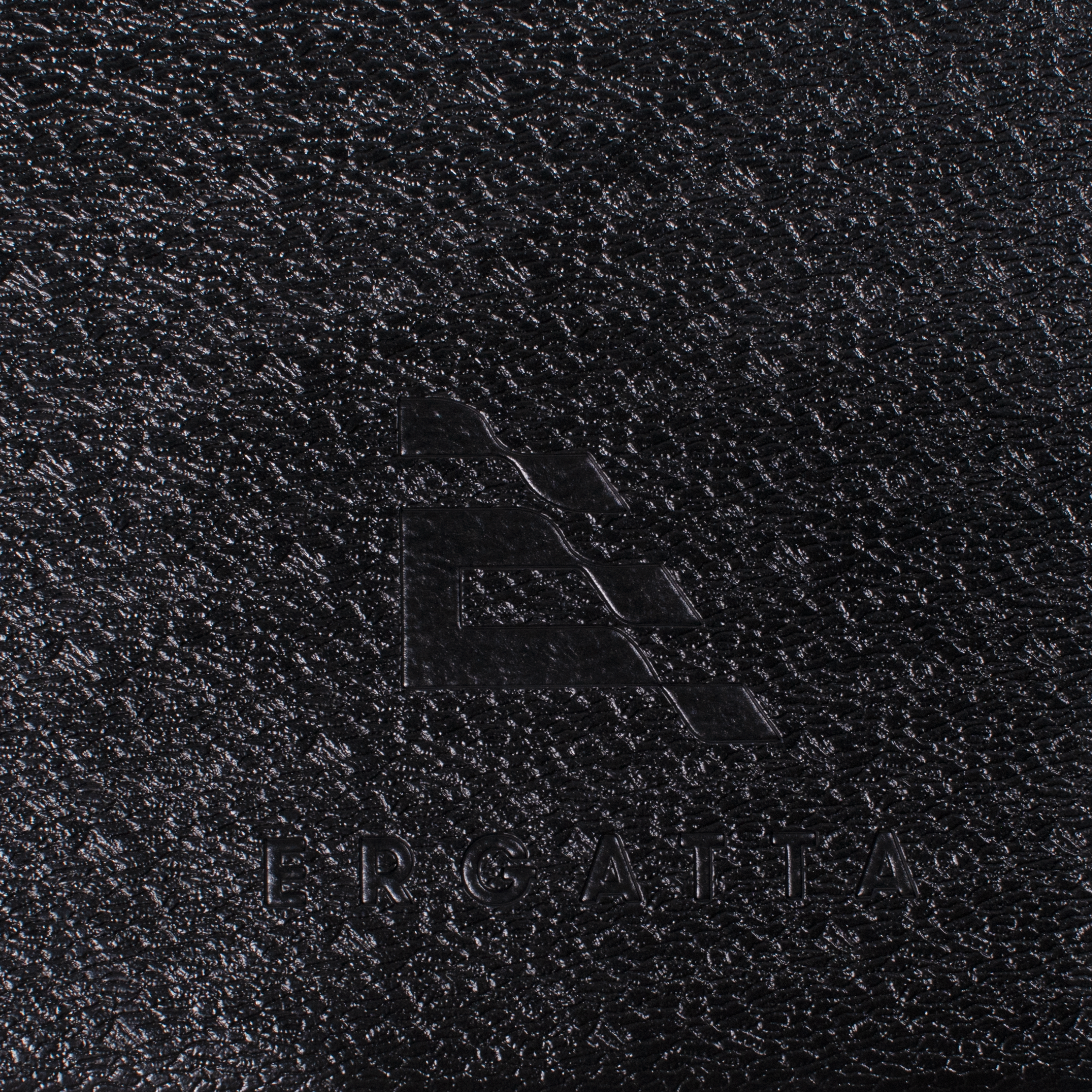 closeup of Ergatta logo on Ergatta rower mat